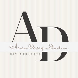 May include: A logo featuring large, bold, dark gray letters A and D. Overlaid across the center is the text Aren Design Studio in a thin, brown, cursive script. Below this, the text DIY PROJECTS appears in small, dark gray, sans-serif capital letters.