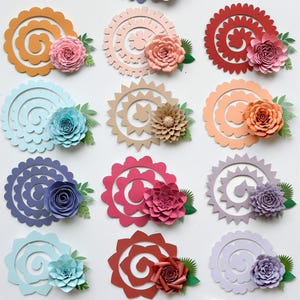 May include: Assortment of colorful paper flowers and decorative swirls in various shades, including pink, orange, blue, and purple. Each flower is paired with a matching swirl and green leaf accents, creating a vibrant and artistic display.