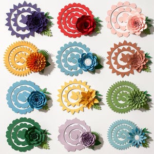 May include: A collection of colorful paper flowers in various designs. Each flower features a spiral or circular base with a contrasting paper flower and green leaf accents. Colors include purple, red, pink, yellow, blue, brown, green, and light blue.