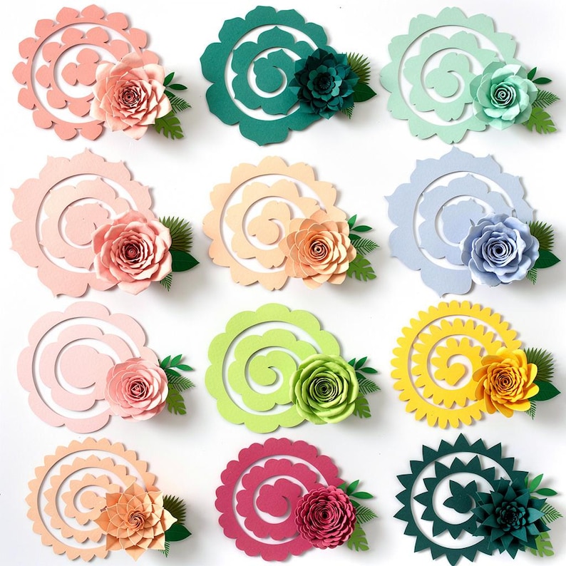 May include: A collection of twelve paper flower arrangements in various colors. Each arrangement features a spiral-shaped base with a paper rose and green paper leaves. Colors include pink, green, yellow, and blue.