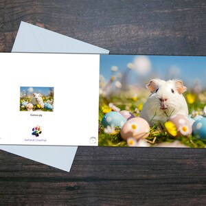 Carte de Pâques pour cochon d'inde, Joli cobaye blanc parmi des œufs de Pâques et des fleurs, Une carte vierge brillante pour les propriétaires d'animaux de compagnie et les amoureux des animaux, Cadeau amusant