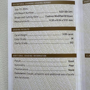 May include: A GIA diamond grading report for a 3.00 carat cushion modified brilliant diamond. The report details the diamond's measurements, colour grade, clarity grade, polish, symmetry, fluorescence, and comments. The report number is 5231351291.