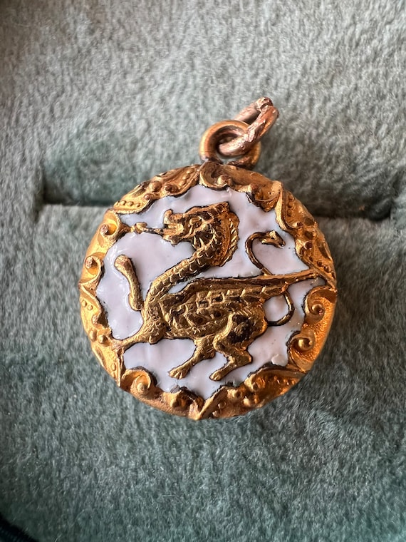 Antique gold tone griffin charm