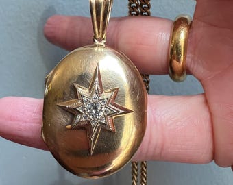 Antique 18k gold and old mine cut diamond North Star locket