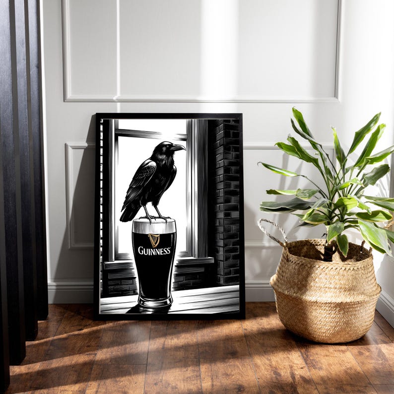 May include: Black and white illustration of a raven perched on top of a glass of Guinness beer. The raven is looking out a window. The glass of beer has the Guinness logo on it.