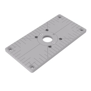 May include: A rectangular light grey router table insert plate featuring a central circular opening, four countersunk screw holes at the corners, and etched measurement markings across the surface with the number 30 printed near the centre.
