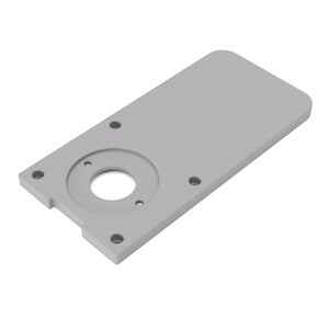 Peut inclure: Une plaque de montage rectangulaire gris clair aux coins arrondis, dotée d'une découpe circulaire centrale entourée de quatre petits trous de vis positionnés symétriquement autour du périmètre de la plaque pour une fixation sécurisée.