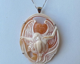 Pendant in genuine Italian cameo hand-engraved on carnelian shell and set in 925 silver. Handmade jewelry in Italy.