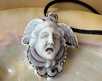 Genuine Italian cameo on sardonyx shell set in solid silver. Handmade jewelry in Italy.