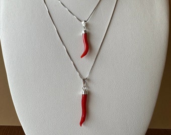 925 silver necklace with a "lucky horn" pendant made of genuine Mediterranean red coral. Handmade in Italy.