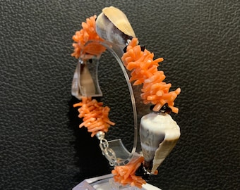 Fringed bracelet made of real Mediterranean coral, Conus shells and silver clasps. Handmade in Italy.