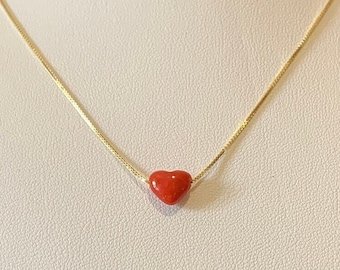 Heart-shaped pendant in real Mediterranean red coral and gold-plated silver chain. Handmade in Italy