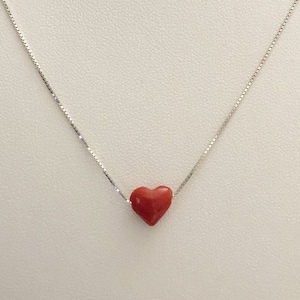 Heart-shaped pendant in real Mediterranean red coral and silver chain. Handmade in Italy.