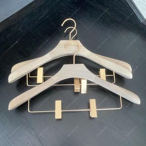 Premium Camphor Wood Hanger with Adjustable Metal Clips, Wooden Clothes Hanger with Trouser Clips for Home and Boutique Storage