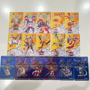 May include: A collection of Monster Hunter Rise trading cards and figurines. The cards feature character illustrations with the game's logo. The figurines are small, detailed figures of various monsters and characters from the game.