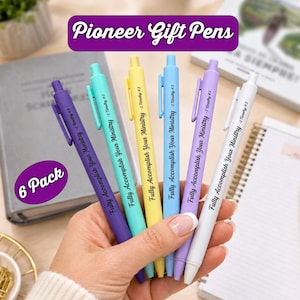 May include: A set of six retractable ballpoint pens in purple, teal, yellow, light blue, lavender, and white. Each pen features a clip and is printed with the text Fully Accomplish Your Ministry - 2 Timothy 4:5 in black ink.
