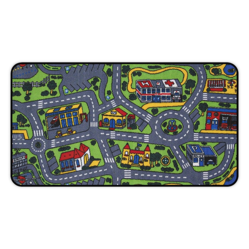 Mousepad with a colorful 90s/2000s-style city street carpet design, featuring winding roads, buildings, and trees on a blank white background.