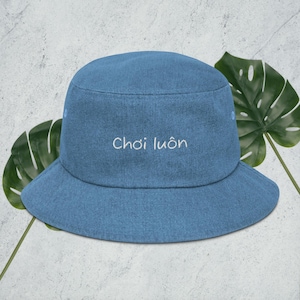 Denim bucket hat Vietnamese white text &quot;Choi Luon&quot;