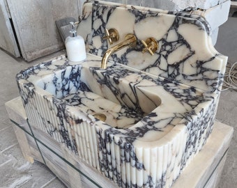 Custom Calacatta Viola marble sink will be made to order with dimensions of 18x12x8 inches.