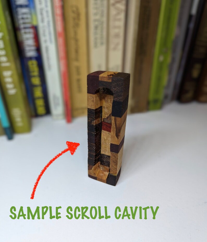 May include: A wooden scroll holder with a rectangular cavity for storing a scroll. The holder is made of various types of wood, including dark brown, light brown, and red wood. The holder is approximately 15 cm tall.