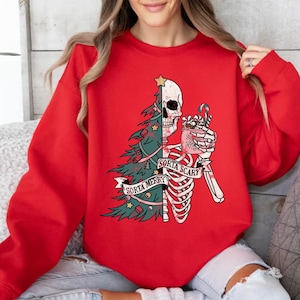 Sorta Merry Sorta Scary Funny Christmas Skeleton Sweatshirt, Gothic holiday crewneck with spooky festive vibe and candy cane cup, Festival