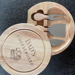 Personalised cheeseboard with three tools.