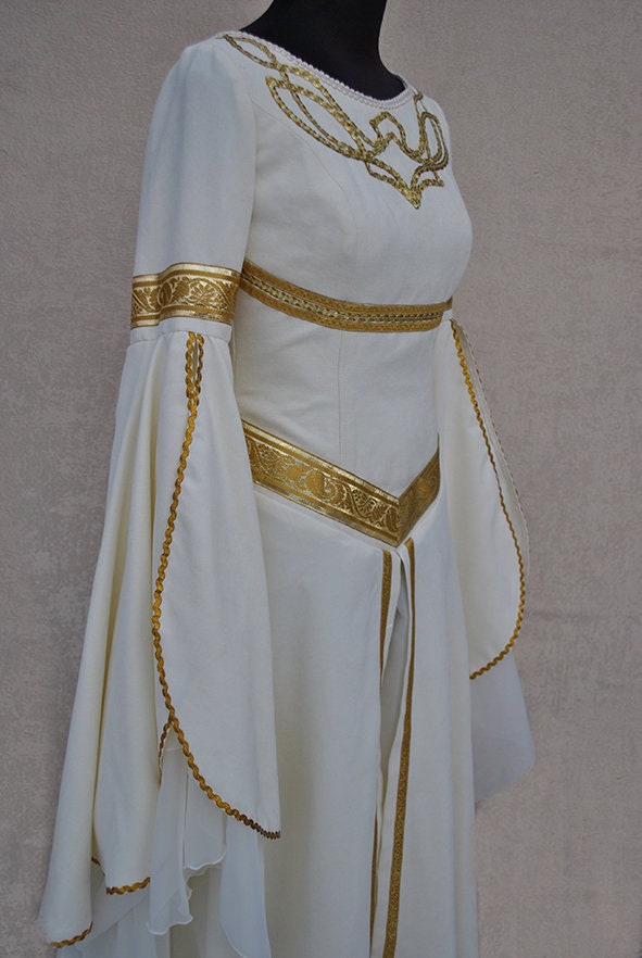 slim fit dress slacks Medieval woman wearing a blue silk bliaut gown with a white wimple (Em   Servian Stock Images