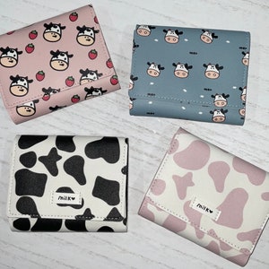 Carteira Tri-Fold Cow Print com personalização no interior