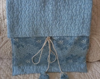 Blue pouch and lace