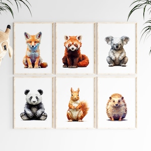 May include: Set of six framed prints featuring geometric animal illustrations. The animals include a fox, red panda, koala, panda, squirrel, and hedgehog. Each print has a white background and a wooden frame.