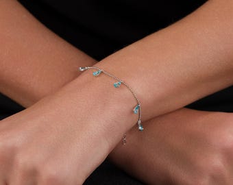 Pulseira em prata de lei com água-marinha em formato de gota, pedra do mês de março, acessório para noivas.