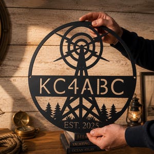 Radio tower sign with trees and custom text