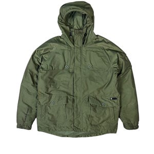 May include: Olive green hooded jacket with multiple pockets and a button-up closure. The jacket features a subtle grid pattern and a logo on the sleeve. The jacket has a drawstring hood and a relaxed fit.