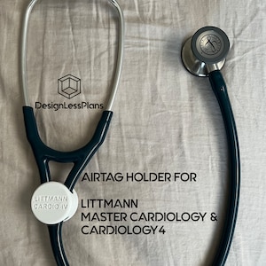 May include: A black stethoscope with a silver chest piece and a white AirTag holder that says "Littmann Cardio IV" attached to it. The text "AIRTAG HOLDER FOR LITTMANN MASTER CARDIOLOGY & CARDIOLOGY 4" is written below the stethoscope.