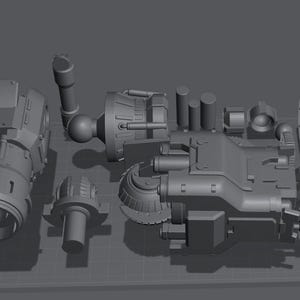 May include: A collection of gray, mechanical components, possibly for a larger machine or model. The parts include cylindrical, rounded, and rectangular shapes, suggesting a complex assembly. The pieces are arranged on a grid-like surface.