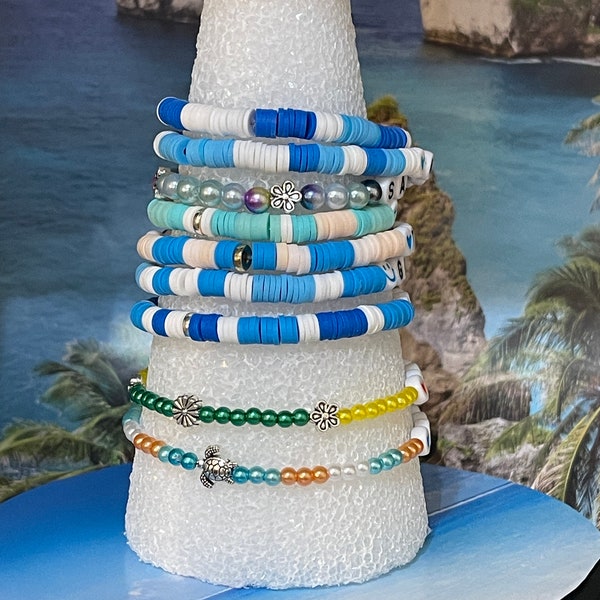 Pure Michigan Bracelets Petoskey, Traverse City and Mackinac more to come. Beautiful colors for summer wear, all have added charms