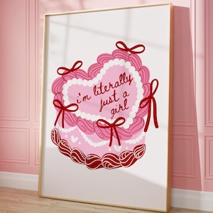 May include: A pink and red heart-shaped graphic with the text "i'm literally just a girl" in red lettering. The heart is decorated with white dots and red bows.
