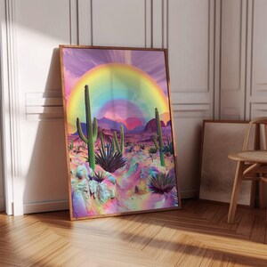 May include: A digital art print featuring a rainbow arching over a desert landscape with cacti and colorful rocks. The sky is a vibrant purple and pink.