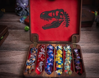 Cofre de dados com tema de dinossauro com conjunto de dados de 11 peças
