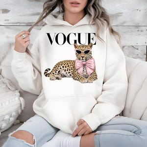 Chic leopard PNG with sunglasses and pink bow fashion design