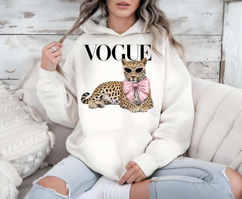 Chic leopard PNG with sunglasses and pink bow fashion design