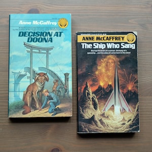 2pk ANNE MCCAFFREY Paperbacks - Decision at Doona 1991 Del Rey & The Ship Who Sang, Throwback Adventure Fantasy Bestselling Novels