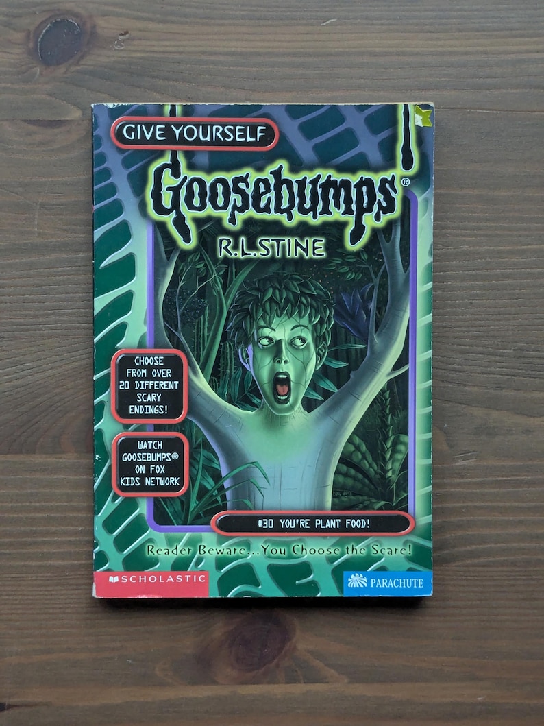 May include: A paperback book titled Give Yourself Goosebumps #30 You're Plant Food! by R.L. Stine. The cover features a green-skinned figure with leaves for hair in a forest setting, with text boxes promoting over 20 scary endings and the Fox Kids show.