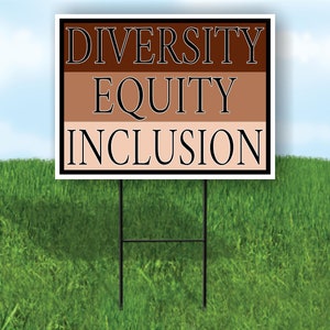 May include: A white sign with black text that reads "DIVERSITY EQUITY INCLUSION". The sign is on a brown and tan background. The sign is on a black metal stake.