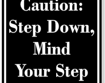 Caution step down mind your step black aluminum composite sign