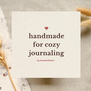 Minimal beige paper-style graphic with soft texture and handwritten-style text reading “handmade for cozy journaling,” representing the boomerbears brand aesthetic.