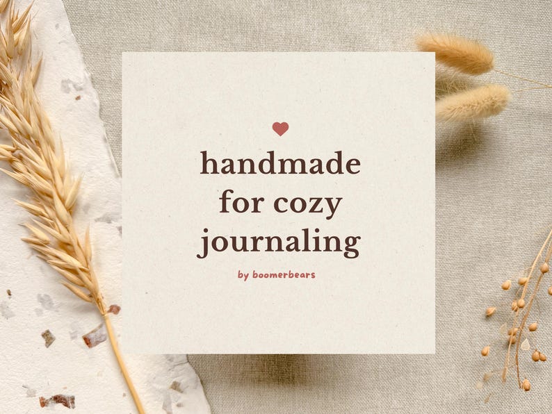 Minimal beige paper-style graphic with soft texture and handwritten-style text reading “handmade for cozy journaling,” representing the boomerbears brand aesthetic.
