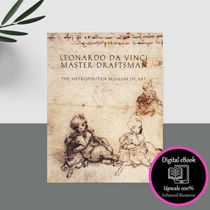 May include: A book cover featuring the title "LEONARDO DA VINCI MASTER DRAFTSMAN" and the text "THE METROPOLITAN MUSEUM OF ART." The cover has sketches of figures. A pink and black circle indicates a digital ebook with enhanced sharpness.