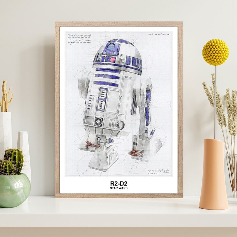 Może przedstawiać: Ilustracja akwarelowa w ramie przedstawiająca R2-D2, droida z Gwiezdnych Wojen, w niebiesko-białej kolorystyce. Ilustracja znajduje się na białym tle z siatką i tekstem "R2-D2 STAR WARS".