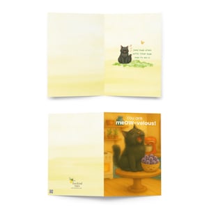 May include: Greeting card with a yellow background and illustrations of a black cat. One image shows a cat on grass with text. The other image shows a cat with the text "You are meow-velous!"